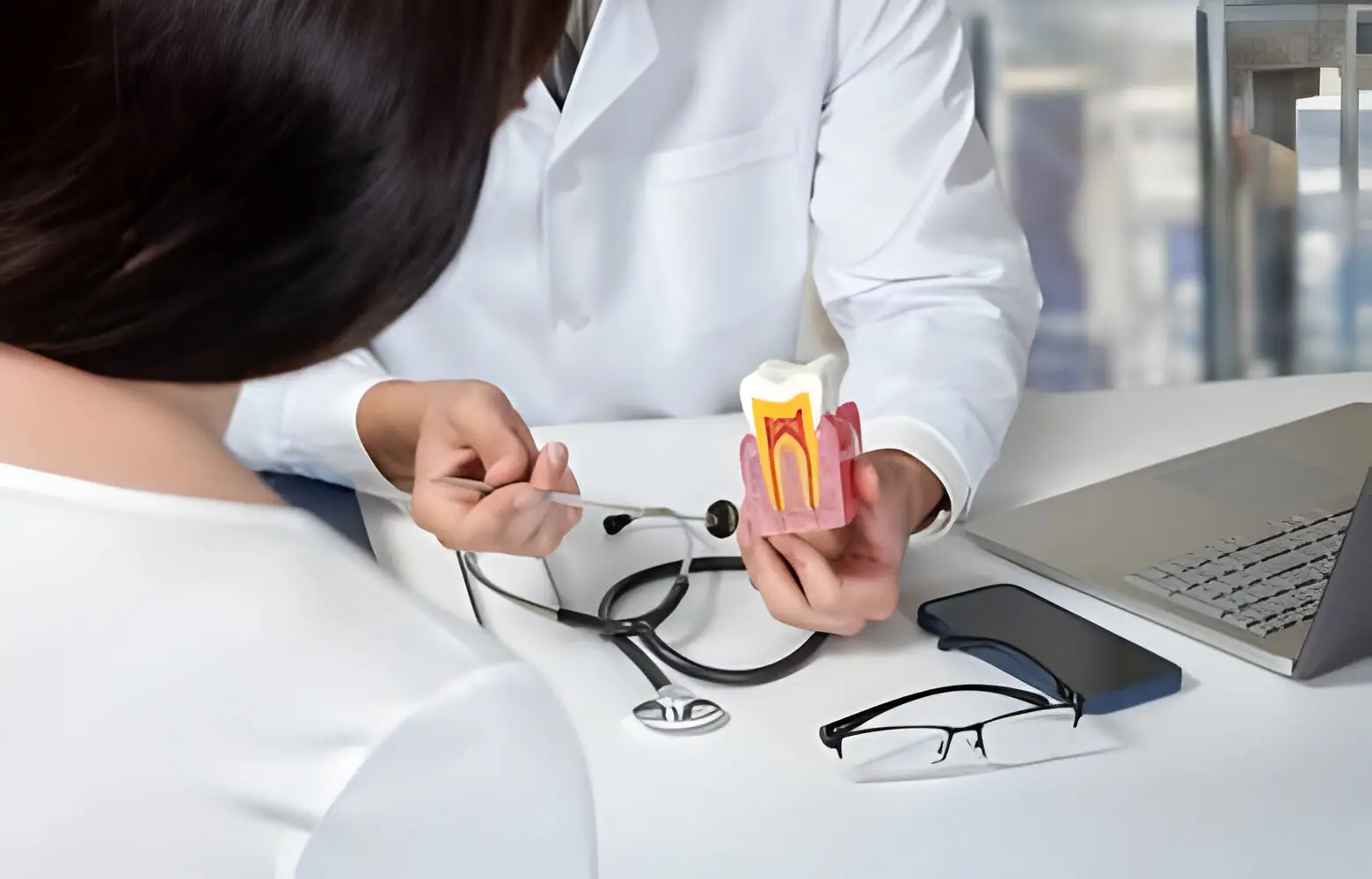 Dentist explaining about tooth condition