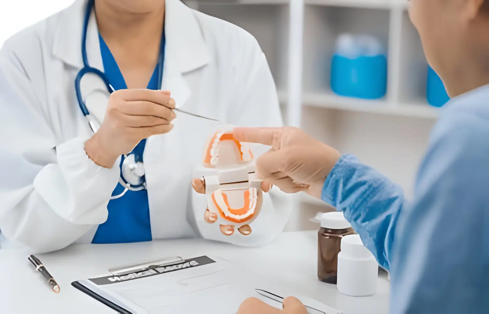 Dentist explaining to patient about their tooth condition.
